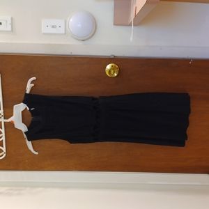 Skinny black dress with waist cut-out